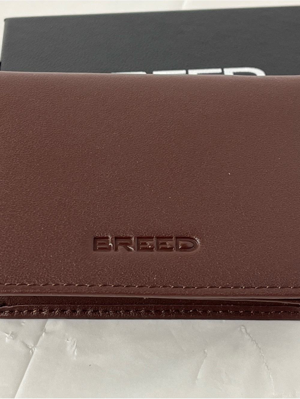 Breed Embossed Leather Wallet in Burgundy Brown